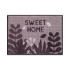 Tapis de patio Home Sweet Home, Derrière la porte